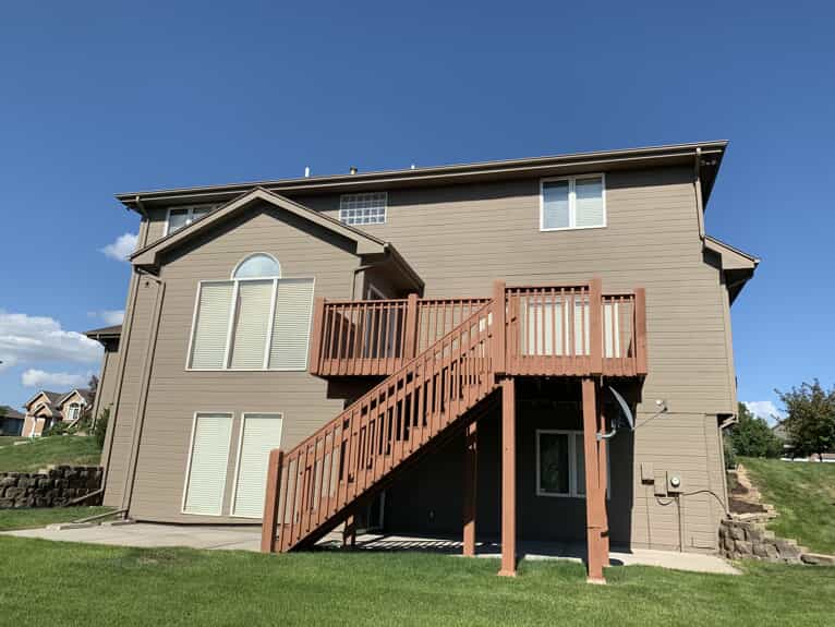 Beige-House-Harrisburg-NC-Rear-Patio-and-Stairs-Color-World-Painting