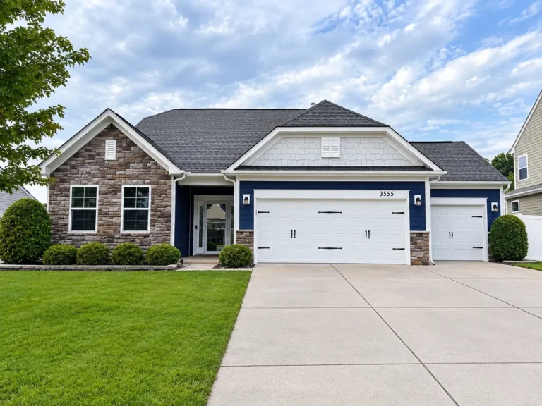 Freshly painted exterior siding on a Denver single-story home by Color World Painting accented with bright white trim